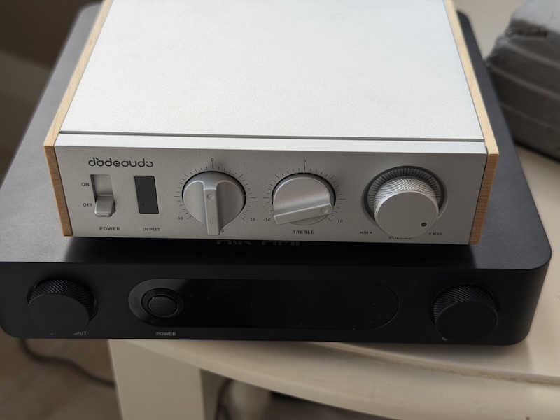 the fiio air amp under a jade audio level 1 integrated amplifier, front panels