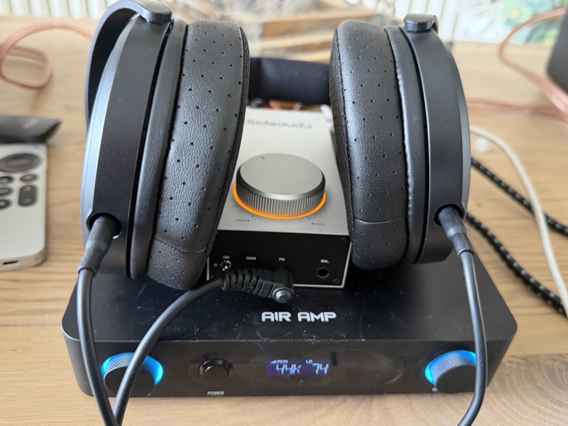 the air amp with the fiio k11 and headphones stacked on top