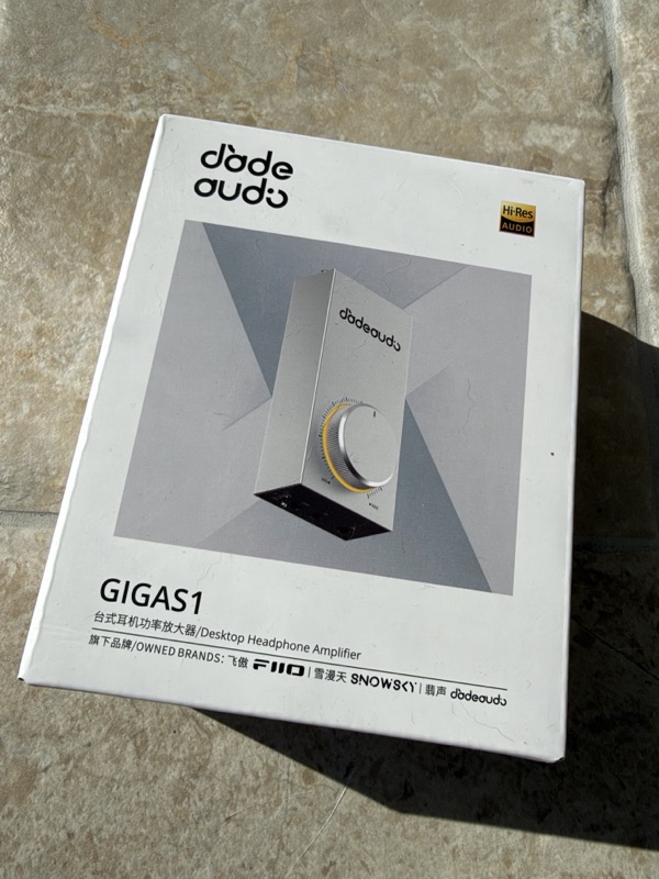 the front of the Gigas1 retail box showing the JadeAudio wordmark and a render of the amplifier