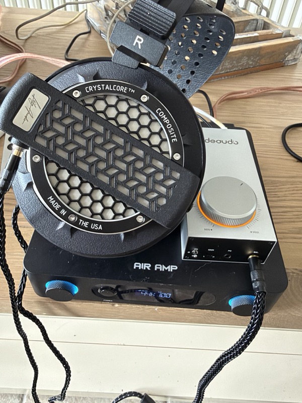 the Gigas1 stacked on a FiiO Air Amp with the Lily Audio Genesis One resting on the pair, its volume ring lit orange