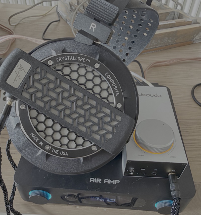 the Gigas1 alongside the Lily Audio Genesis One, its CrystalCore driver grille and Made in the USA ring visible
