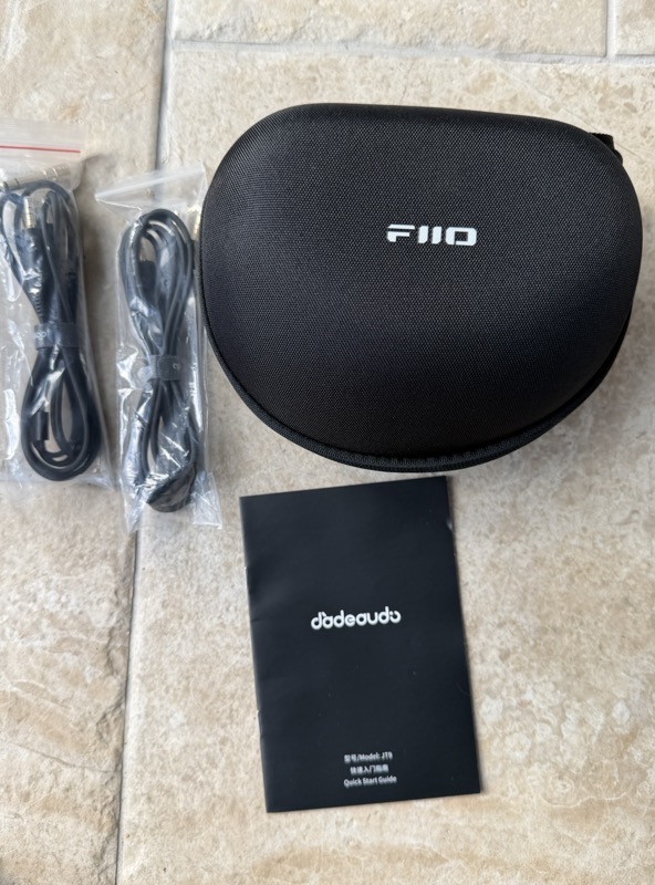 jt9 box contents: hard case, quick start guide and two bagged cables