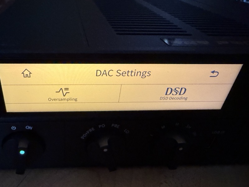 dac settings menu on the amber display showing oversampling and dsd decoding