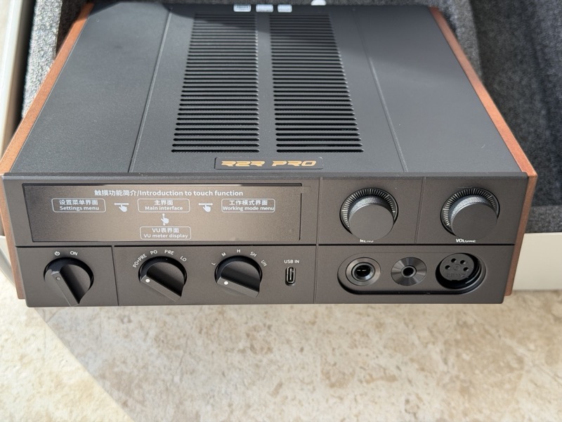 k17 r2r front panel showing power knob, output selector, five-position gain switch, usb-c input, menu and volume knobs and three headphone outputs
