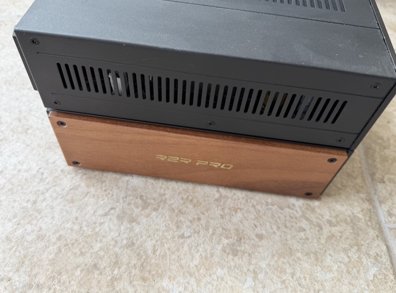 the k17 r2r from above showing side vent slots and the walnut cheek standing proud of the chassis