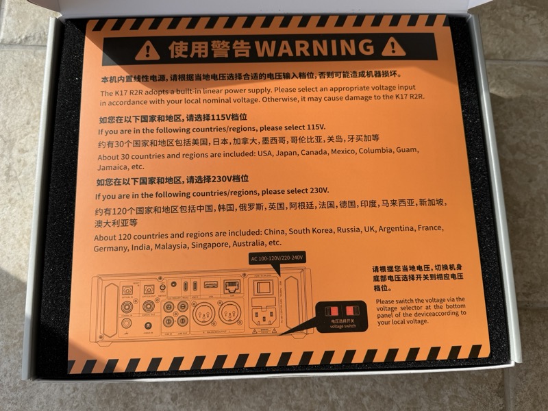 the voltage warning card in full, listing 115v and 230v regions