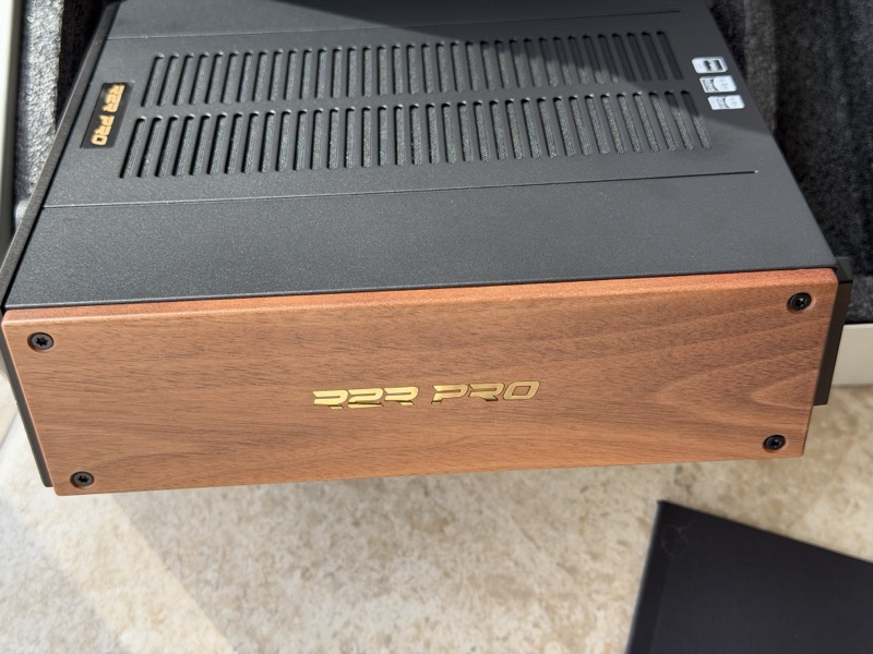 black walnut side cheek with the gold r2r pro inlay and four visible screws